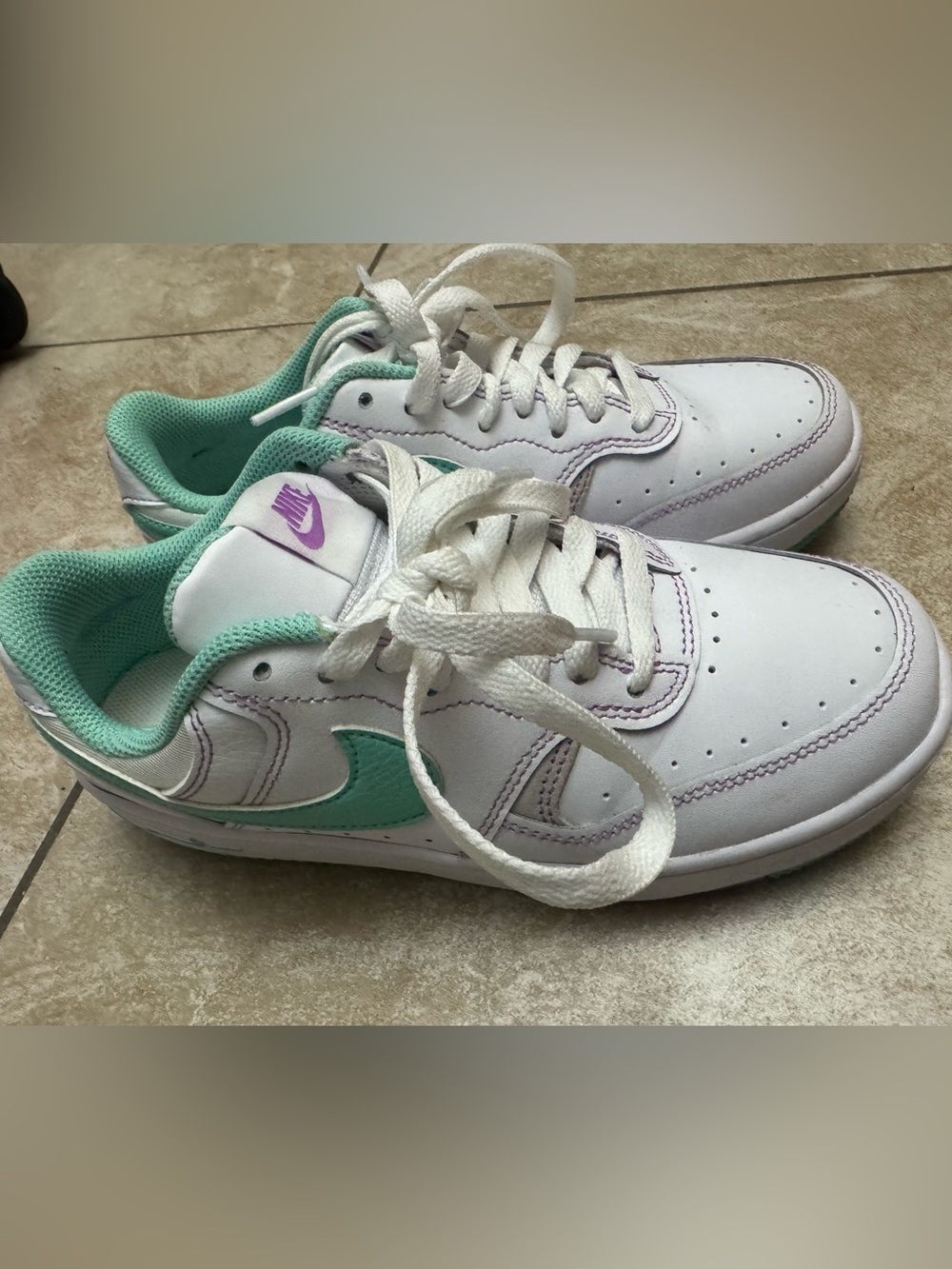 Nike White Sneakers with Mint Green Swoosh and Purple Trim
